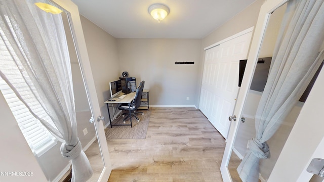165 W National Ave, Winnemucca, NV 89445 - home office with french doors, baseboards, and wood finished floors