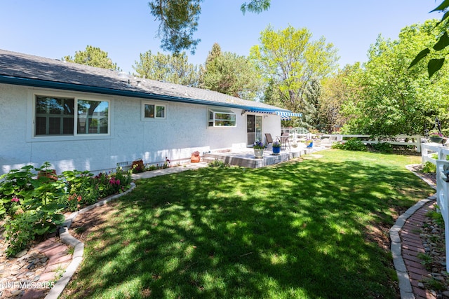 1745 Fir Tree Cir, Minden, NV 89423 - back of house with a patio area and stucco siding