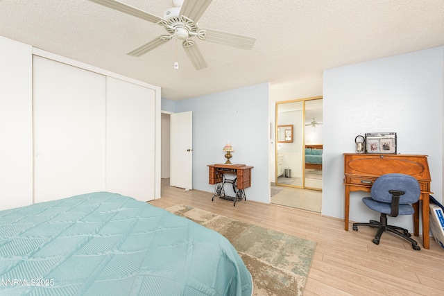 1745 Fir Tree Cir, Minden, NV 89423 - bedroom featuring light wood finished floors, ceiling fan, and a textured ceiling