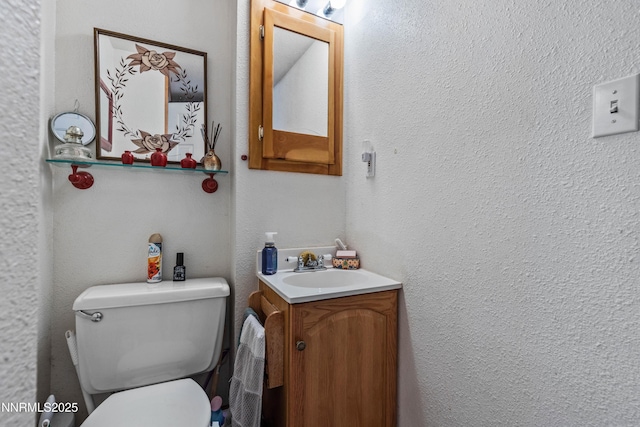 2450 Pinter Ave, South Lake Tahoe, CA 96150 - bathroom with vanity and toilet