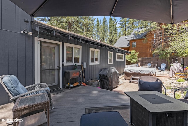 2450 Pinter Ave, South Lake Tahoe, CA 96150 - deck with a hot tub and a grill