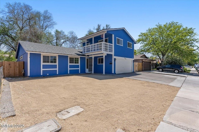 983 Glen Meadow Dr, Sparks, NV 89434 - view of front of home featuring a balcony, concrete driveway, and a garage