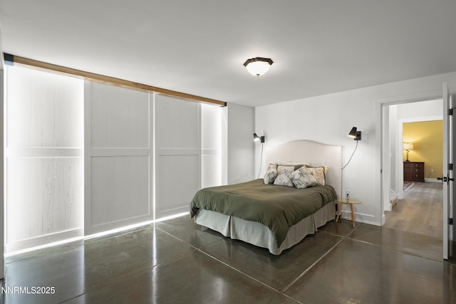 736 Kelly Dr, Incline Village, NV 89451 - bedroom with concrete floors and baseboards