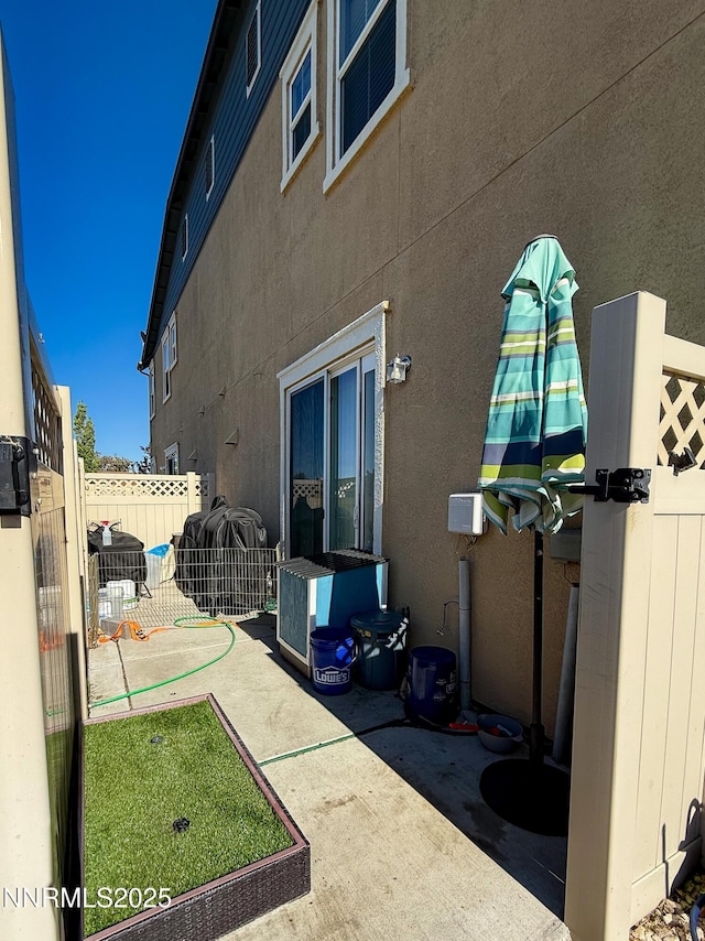 1201 Fonterra Way, Carson City, NV 89701 - view of home's exterior with a patio area and stucco siding
