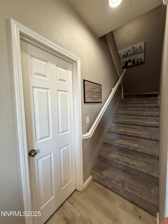 1201 Fonterra Way, Carson City, NV 89701 - stairway featuring wood finished floors and baseboards