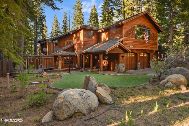 1724 Mohican Dr, South Lake Tahoe, CA 96150 - view of front of property with an attached garage, driveway, and a shingled roof