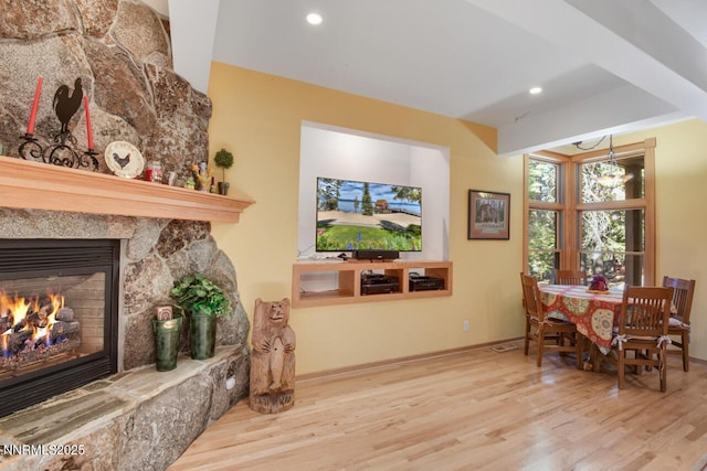 1724 Mohican Dr, South Lake Tahoe, CA 96150 - dining room featuring wood finished floors, a fireplace, and recessed lighting