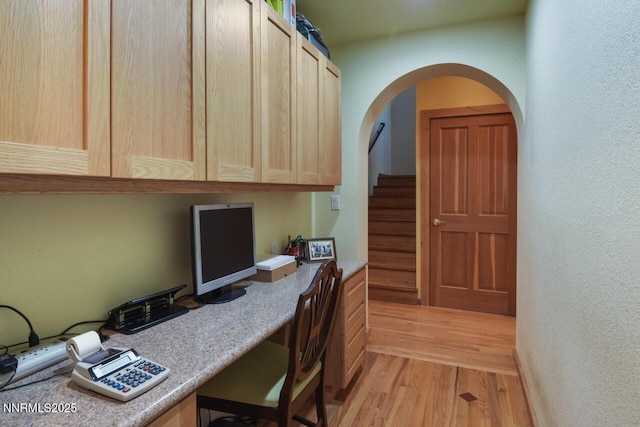 1724 Mohican Dr, South Lake Tahoe, CA 96150 - home office featuring light wood finished floors and arched walkways