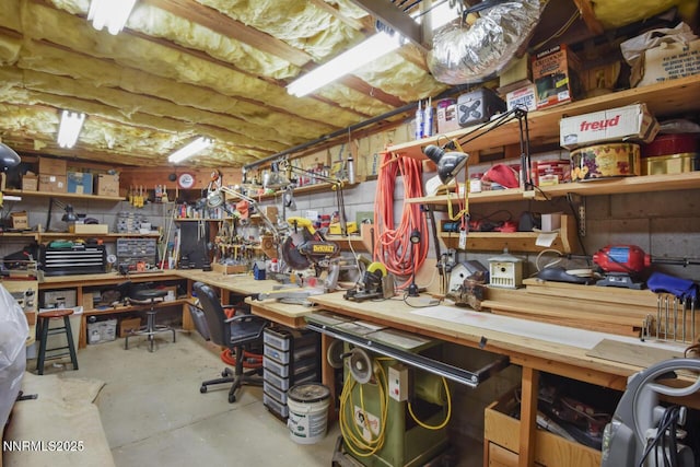 1724 Mohican Dr, South Lake Tahoe, CA 96150 - miscellaneous room with a workshop area and concrete flooring