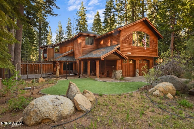 1724 Mohican Dr, South Lake Tahoe, CA 96150 - view of front of house featuring a front lawn