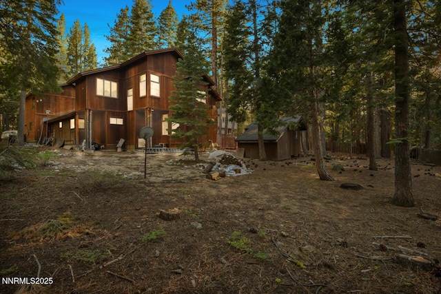 1724 Mohican Dr, South Lake Tahoe, CA 96150 - rear view of house featuring a shed