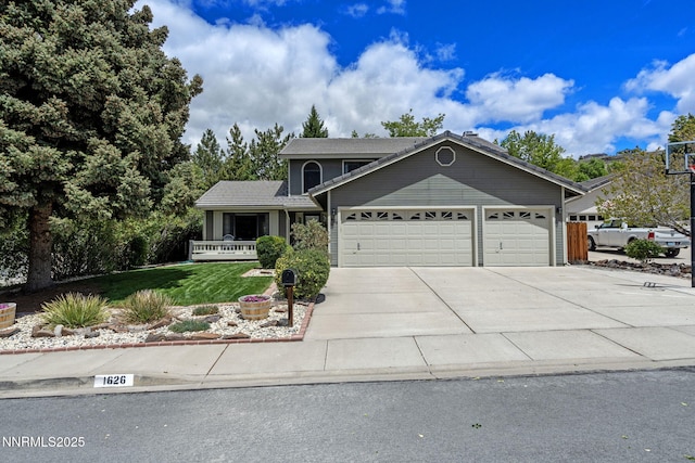 1626 Spring View Ct, Sparks, NV 89436 - traditional home with a garage, a front lawn, driveway, and a porch