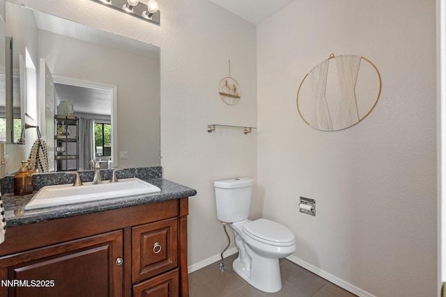 1626 Spring View Ct, Sparks, NV 89436 - bathroom featuring toilet, baseboards, vanity, and tile patterned flooring