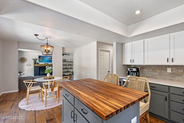 1626 Spring View Ct, Sparks, NV 89436 - kitchen featuring wood counters, gray cabinets, white cabinets, decorative backsplash, and recessed lighting
