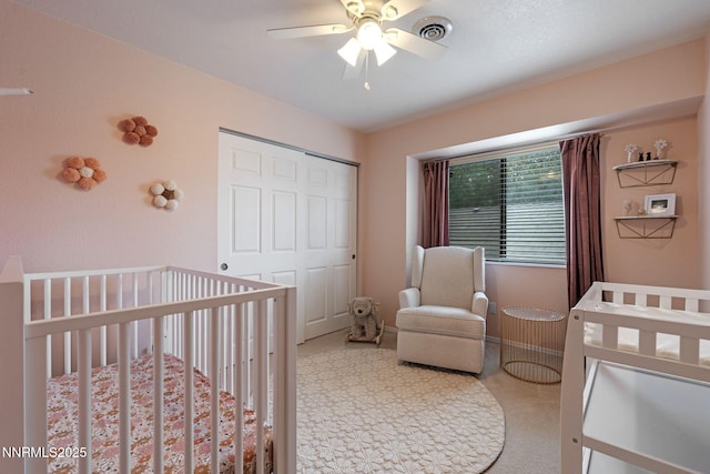 1626 Spring View Ct, Sparks, NV 89436 - bedroom with a closet, a nursery area, and ceiling fan
