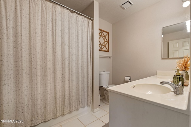 1626 Spring View Ct, Sparks, NV 89436 - bathroom with tile patterned floors, double vanity, toilet, and a shower with shower curtain
