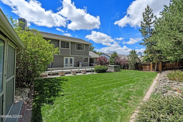 1626 Spring View Ct, Sparks, NV 89436 - view of yard with a hot tub, a deck, and french doors
