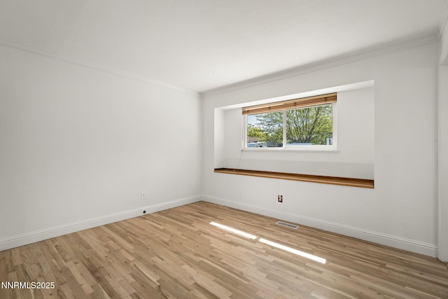 1420 Exeter Way, Reno, NV 89503 - empty room featuring crown molding, light wood-type flooring, and baseboards