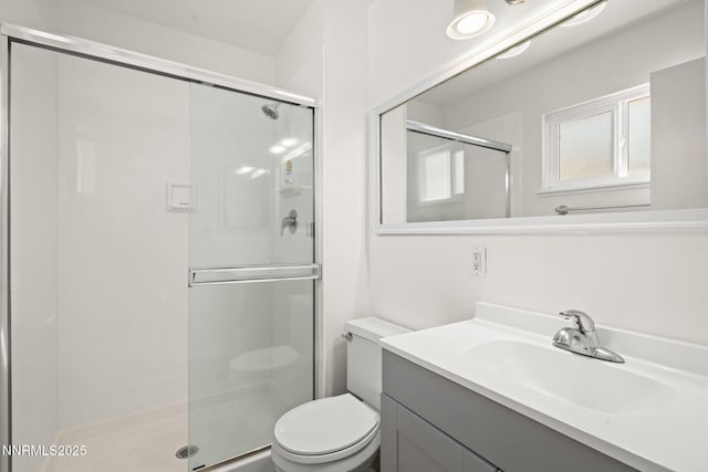 1420 Exeter Way, Reno, NV 89503 - full bathroom with vanity, a shower stall, and toilet