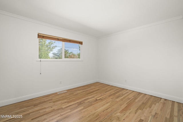 1420 Exeter Way, Reno, NV 89503 - spare room with light wood-style floors, crown molding, and baseboards