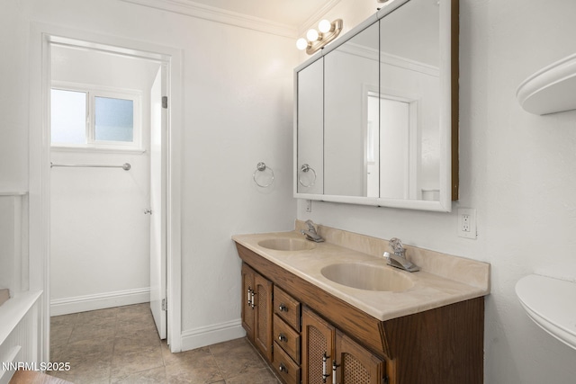 1420 Exeter Way, Reno, NV 89503 - full bath with double vanity, ornamental molding, baseboards, and toilet