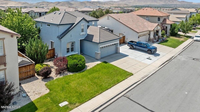 6595 Geranium Way, Sparks, NV 89436 - aerial view of residential area with a mountain backdrop
