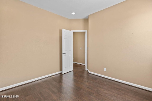 6595 Geranium Way, Sparks, NV 89436 - empty room with baseboards, dark wood-style flooring, and recessed lighting