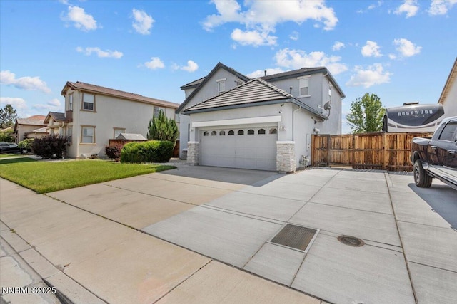 6595 Geranium Way, Sparks, NV 89436 - traditional-style home featuring stucco siding, stone siding, an attached garage, and concrete driveway