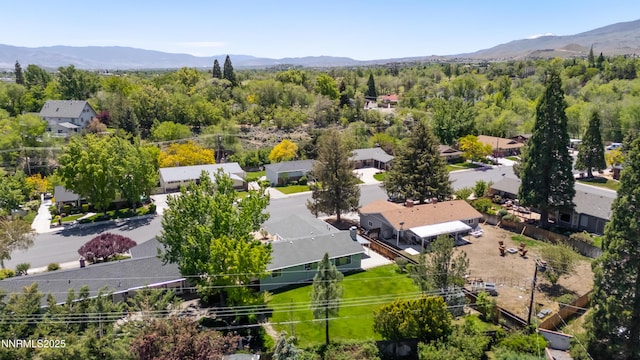 745 Rosewood Dr, Reno, NV 89509 - aerial perspective of suburban area with mountains and a heavily wooded area