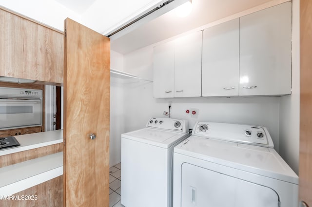 745 Rosewood Dr, Reno, NV 89509 - laundry area with washer and dryer, cabinet space, and light tile patterned floors