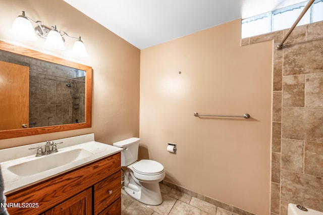 745 Rosewood Dr, Reno, NV 89509 - full bathroom with tiled shower, toilet, vanity, and baseboards