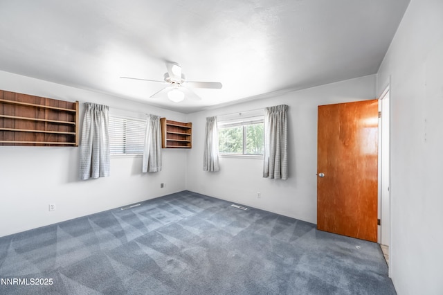 745 Rosewood Dr, Reno, NV 89509 - unfurnished bedroom with carpet floors and ceiling fan