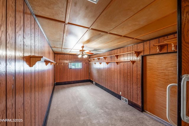 745 Rosewood Dr, Reno, NV 89509 - empty room featuring wood walls, a ceiling fan, carpet, and baseboards