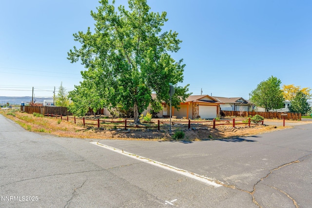 12 S Patterson Pl, Sparks, NV 89436 - view of front of home with a fenced front yard and a garage