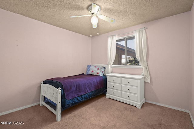 12 S Patterson Pl, Sparks, NV 89436 - bedroom with light colored carpet, a textured ceiling, ceiling fan, and baseboards