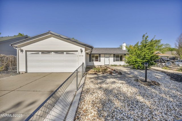 2480 Meadowbrook Ln, Carson City, NV 89701 - single story home with concrete driveway, a garage, and a chimney