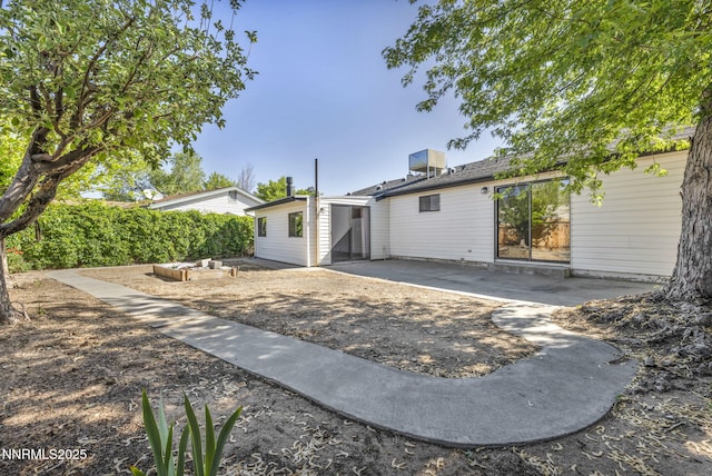 2480 Meadowbrook Ln, Carson City, NV 89701 - rear view of house featuring a patio