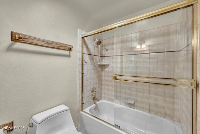 2480 Meadowbrook Ln, Carson City, NV 89701 - bathroom featuring enclosed tub / shower combo, toilet, and a textured wall