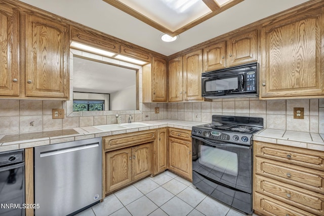 2480 Meadowbrook Ln, Carson City, NV 89701 - kitchen with black appliances, a sink, light tile patterned flooring, and backsplash