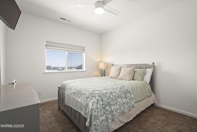 2266 Hayfield Ln, Fernley, NV 89408 - bedroom with dark colored carpet, baseboards, and a ceiling fan