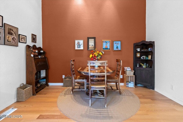 742 Long Valley Rd, Gardnerville, NV 89460 - dining area featuring light wood-type flooring and baseboards