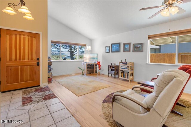 742 Long Valley Rd, Gardnerville, NV 89460 - foyer entrance with vaulted ceiling, a ceiling fan, and a chandelier