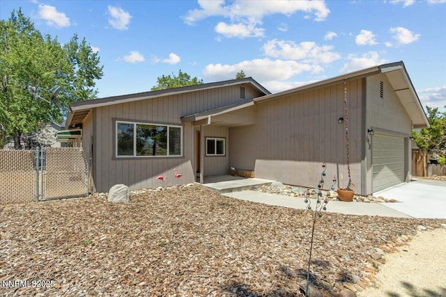 742 Long Valley Rd, Gardnerville, NV 89460 - view of front facade with a garage and concrete driveway