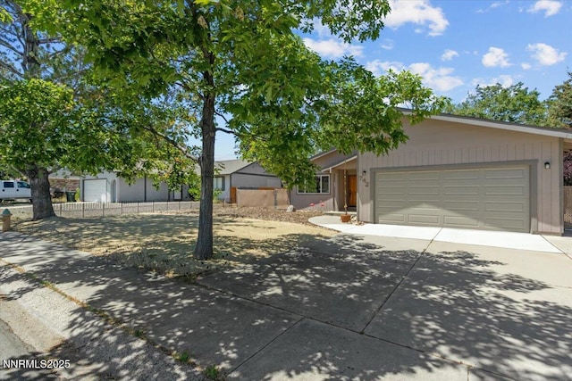 742 Long Valley Rd, Gardnerville, NV 89460 - view of front facade with concrete driveway and a garage