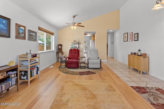 742 Long Valley Rd, Gardnerville, NV 89460 - living area featuring vaulted ceiling, ceiling fan, and light wood finished floors