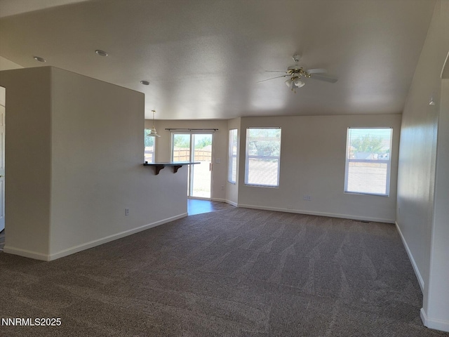 159 Shadow Mountain Dr, Fernley, NV 89408 - unfurnished room with carpet flooring, ceiling fan, and baseboards