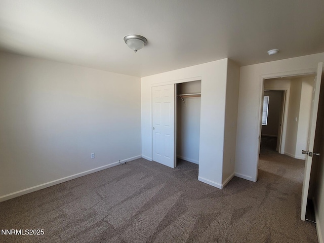 159 Shadow Mountain Dr, Fernley, NV 89408 - unfurnished bedroom featuring carpet floors, baseboards, and a closet