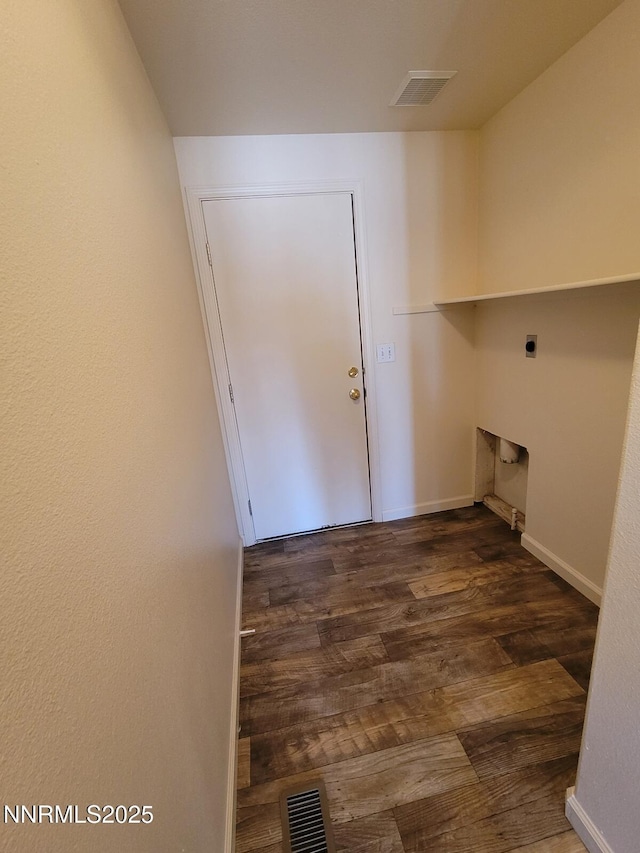 159 Shadow Mountain Dr, Fernley, NV 89408 - laundry area with wood finished floors, electric dryer hookup, and baseboards
