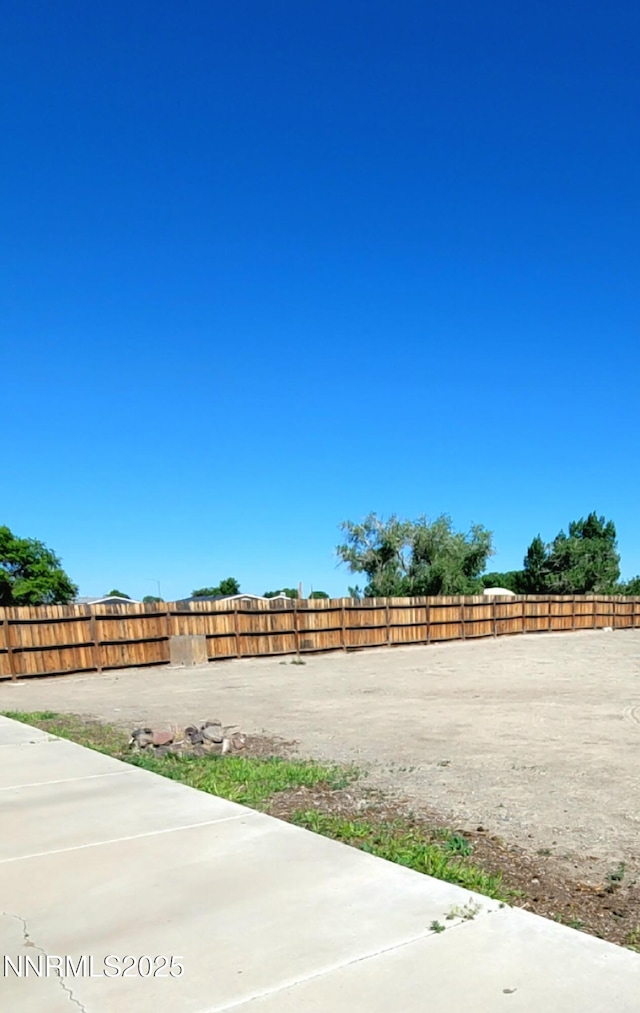 159 Shadow Mountain Dr, Fernley, NV 89408 - fenced backyard featuring a patio