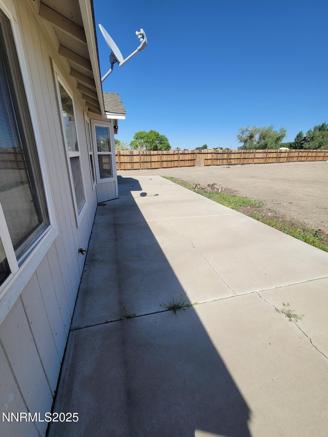 159 Shadow Mountain Dr, Fernley, NV 89408 - fenced backyard featuring a patio